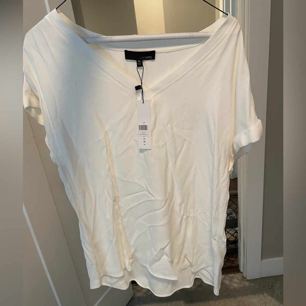 White top, never worn tag on